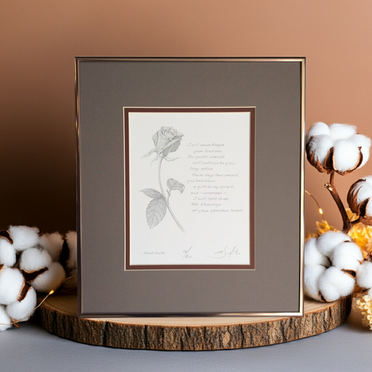 Framed artwork with a rose illustration and poem on a wooden stand with decorative elements.
