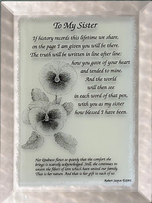 Framed poem titled 'To My Sister' with a floral design on a light background.