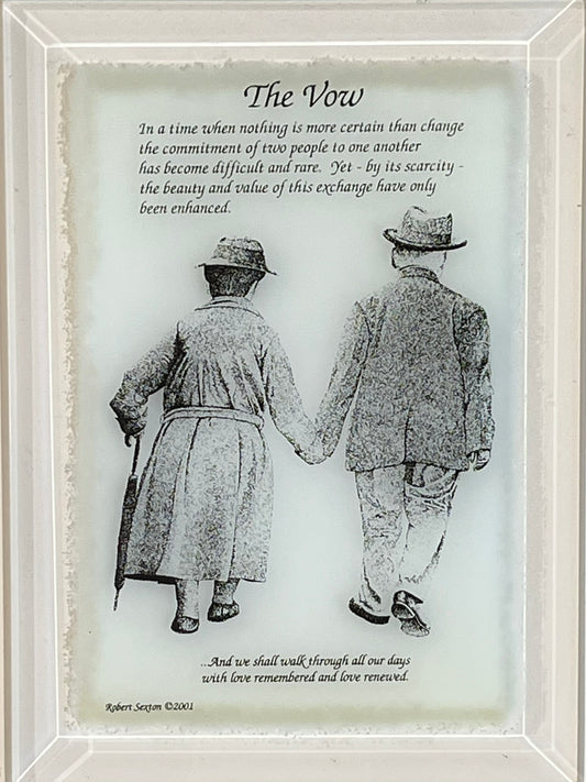 Framed artwork of two people holding hands with a poem titled 'The Vow'