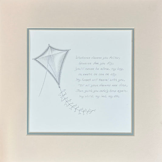 Matted artwork with a kite illustration and text on a light background