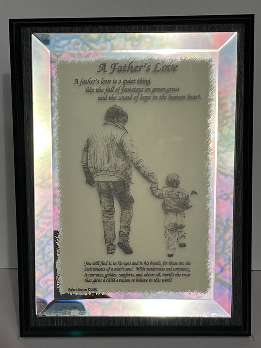 Framed artwork of a father and child holding hands with a quote about father's love.
