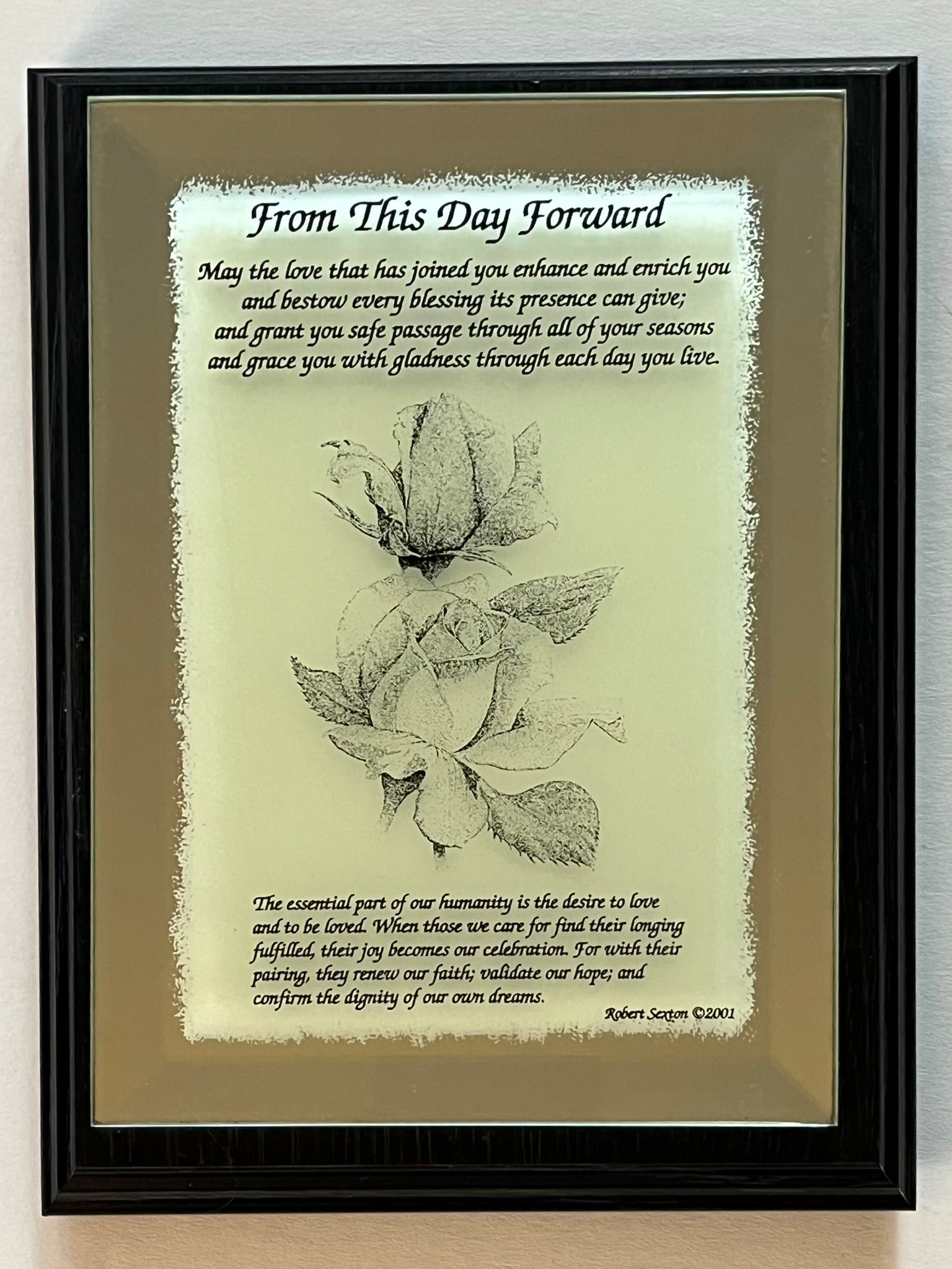 Decorative plaque with floral design and inspirational text 