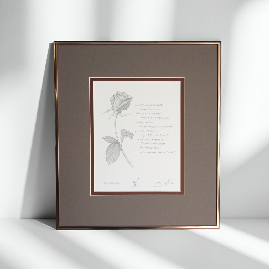Framed artwork with a rose illustration and poem on a white background