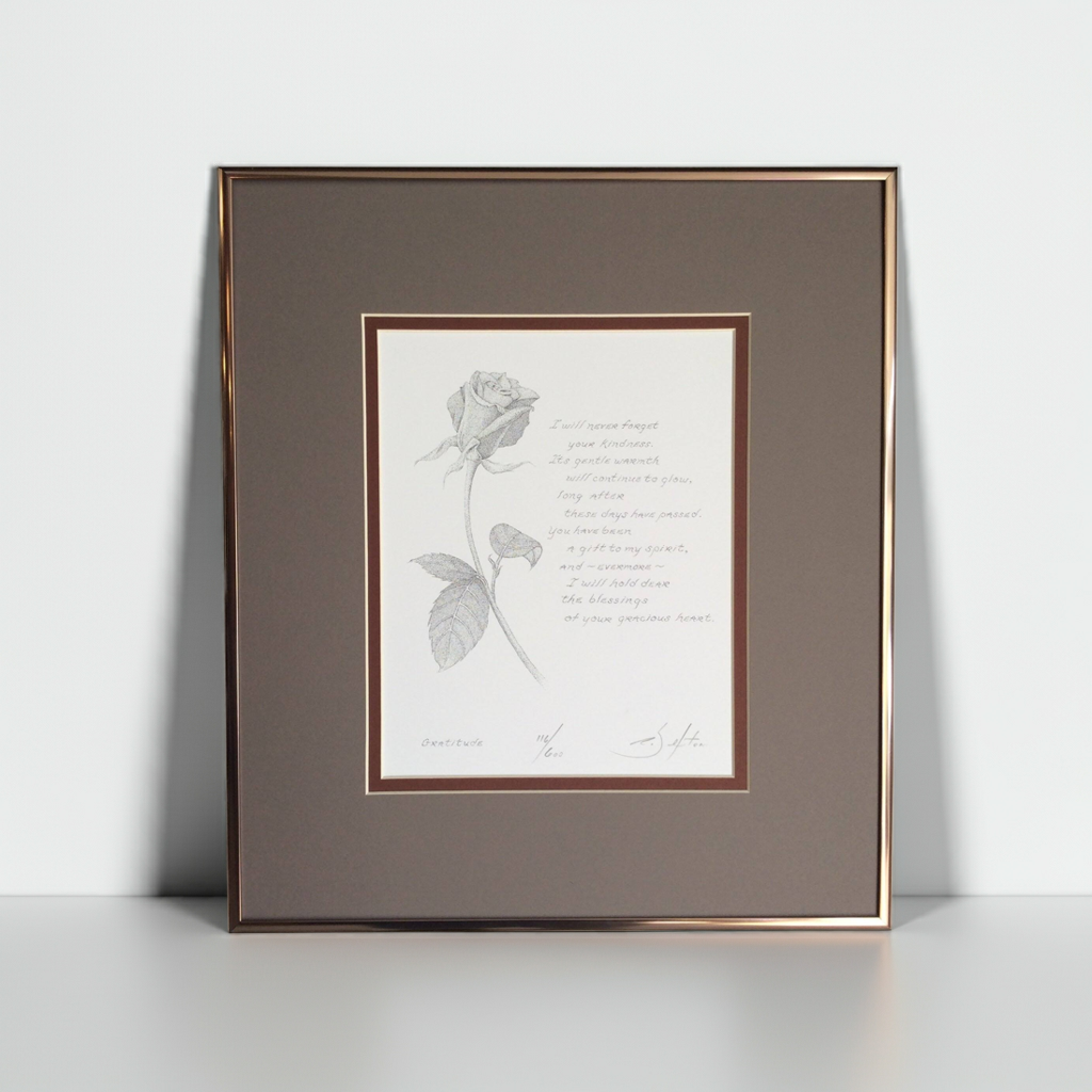 Framed artwork with a rose illustration and poem on a white background