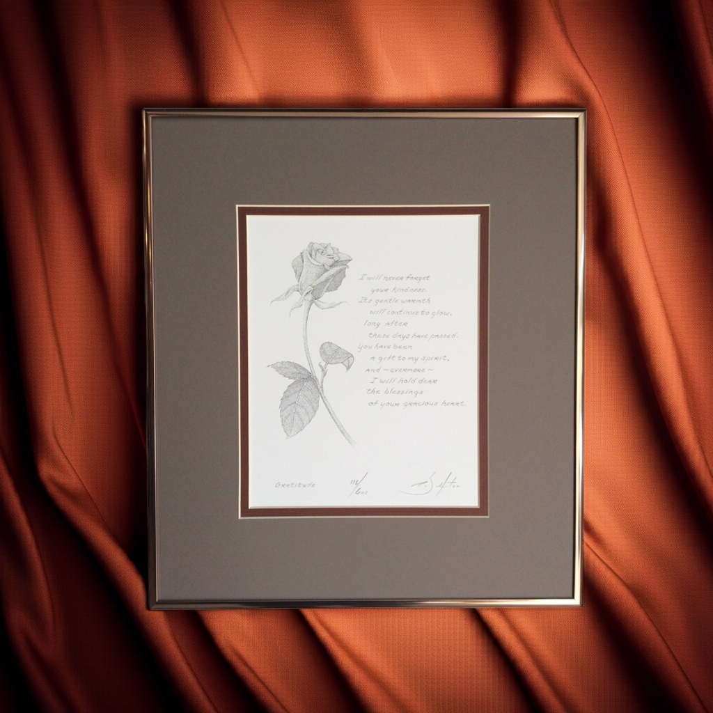 Framed artwork with a rose illustration and poem on an orange fabric background