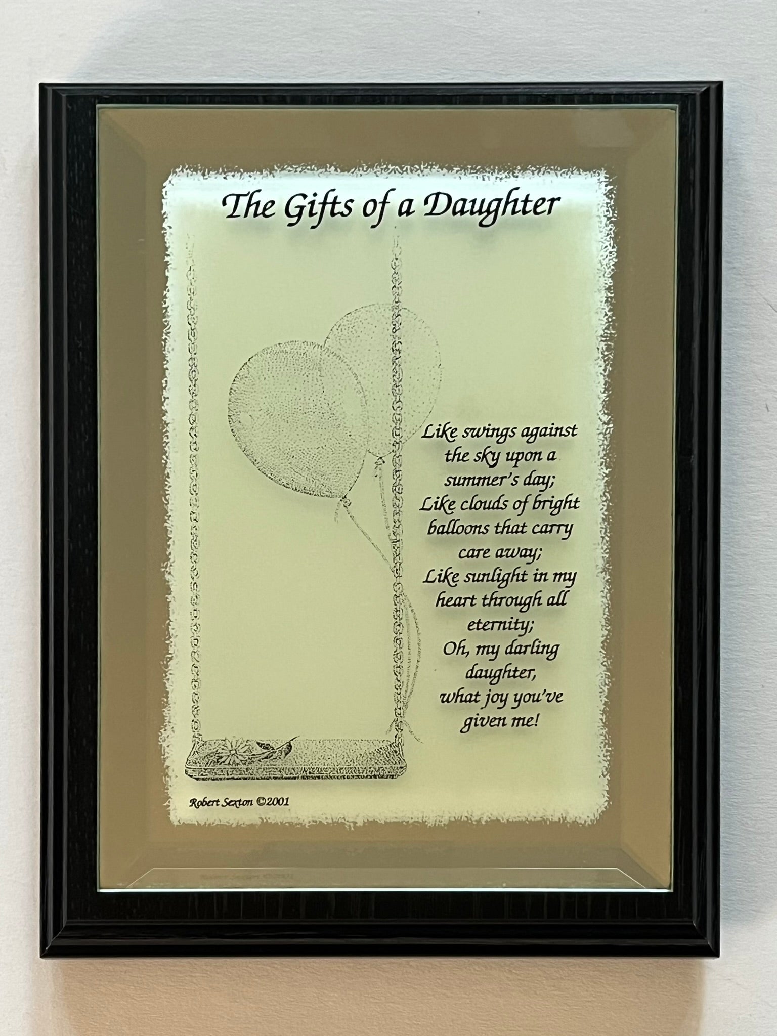 Decorative glass panel with a poem titled 'The Gifts of a Daughter' featuring a swing and balloons.