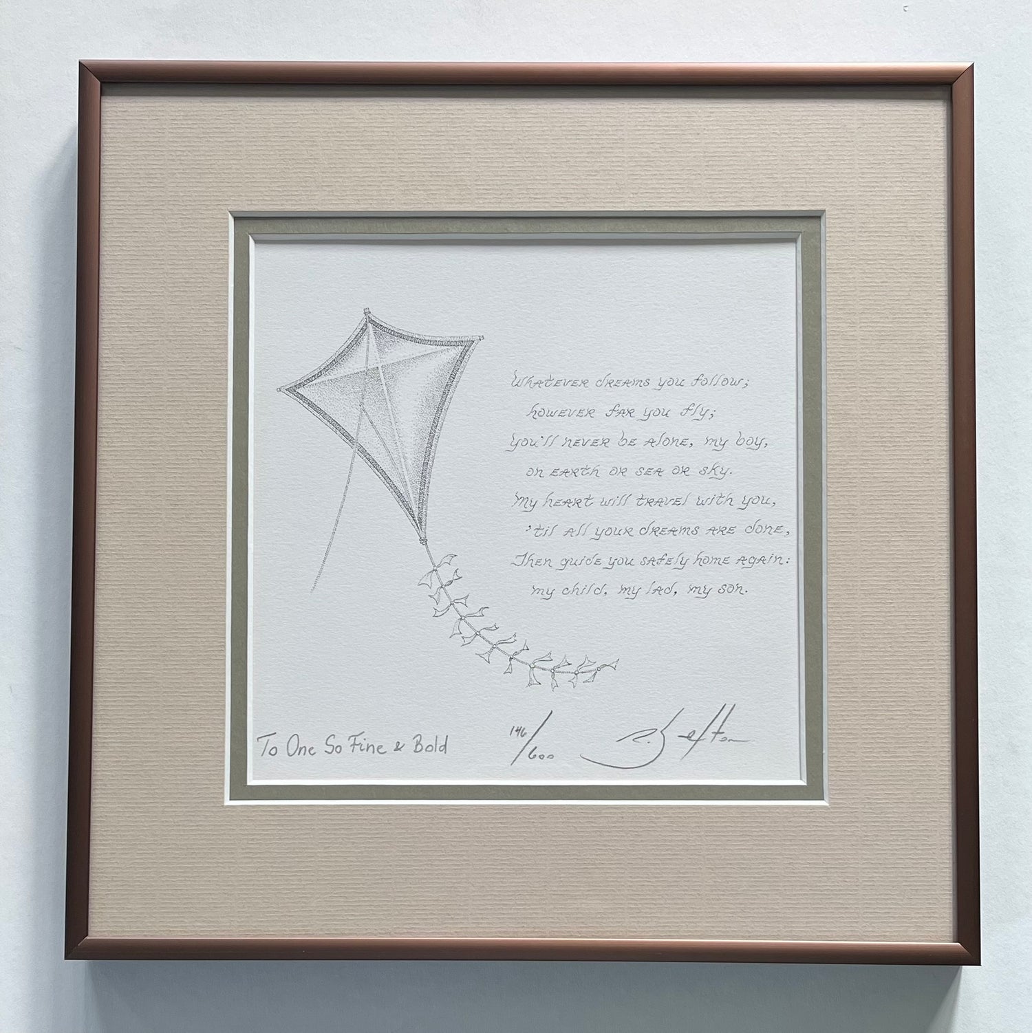 Framed artwork with a kite illustration and text on a light background