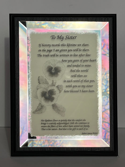 Framed poem titled 'To My Sister' with a floral design on a light background.